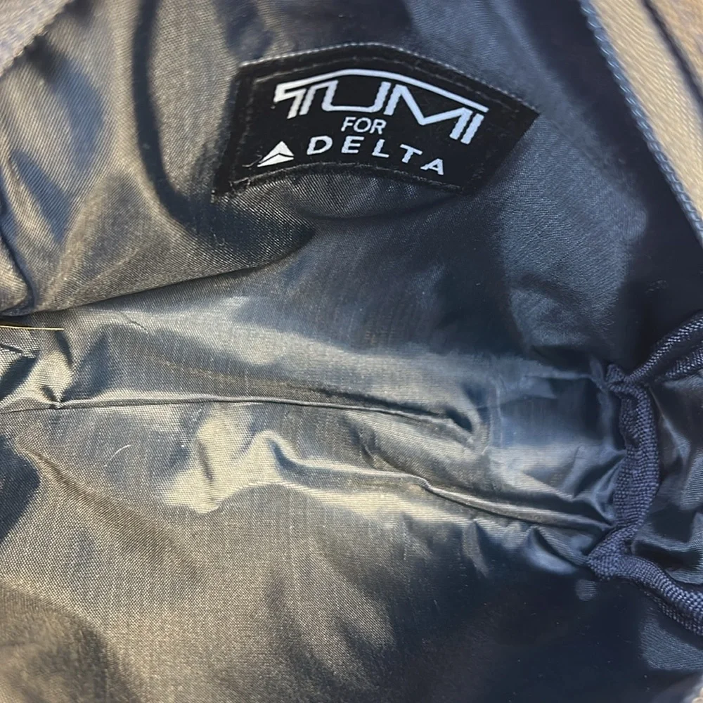 Tumi NWT cosmetic travel bag filled with goodies all new in packages